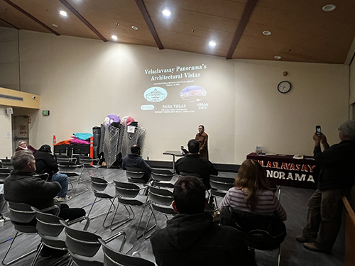 image of attendees and presentation